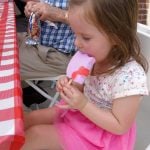Photo of child eating ice cream at Teddy Bear Picnic