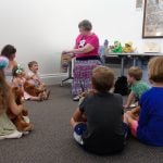Photo of children and storyteller at Teddy Bear Picnic event